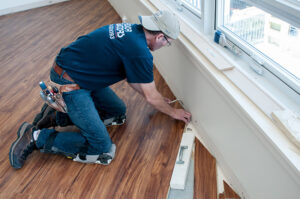 man-installing-flooring-header.jpg